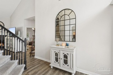 Fully renovated and move-in ready! Nestled within a serene gated - photo 6