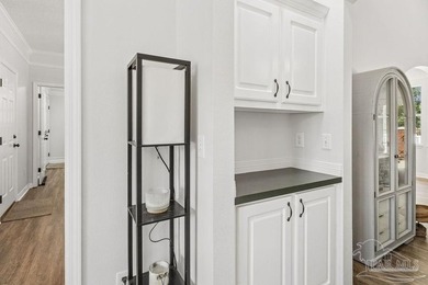 Fully renovated and move-in ready! Nestled within a serene gated - photo 9