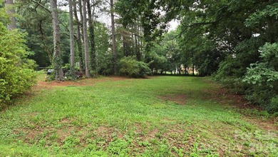 Build your dream home on this spacious vacant lot located at - photo 1