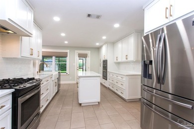 Must See in Cordova Park! This 4-bedroom, 3.5-bathroom home with - photo 9