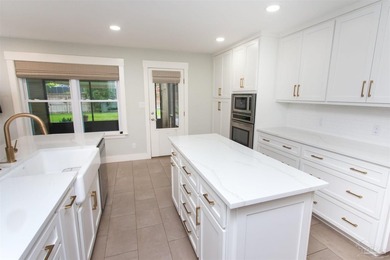 Must See in Cordova Park! This 4-bedroom, 3.5-bathroom home with - photo 10