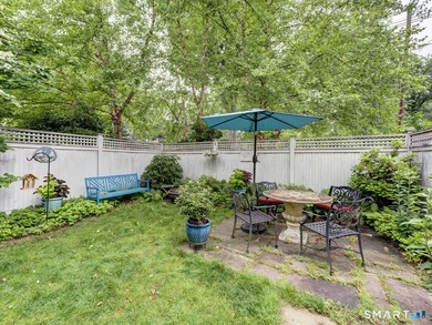 Welcome home to this picturesque brick Colonial, where timeless - photo 2