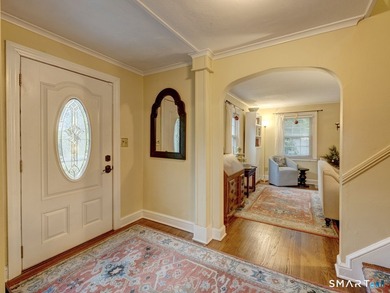 Welcome home to this picturesque brick Colonial, where timeless - photo 3