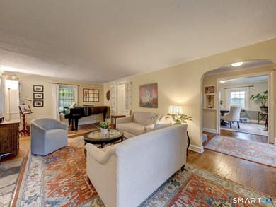Welcome home to this picturesque brick Colonial, where timeless - photo 4
