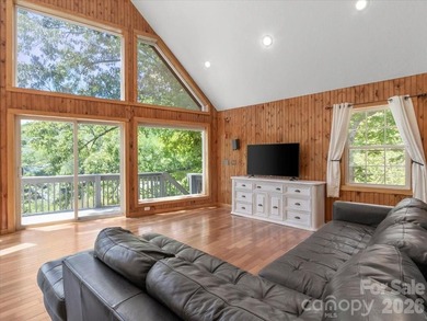 Escape to this warm and inviting 1.5-story mountain home set on - photo 4