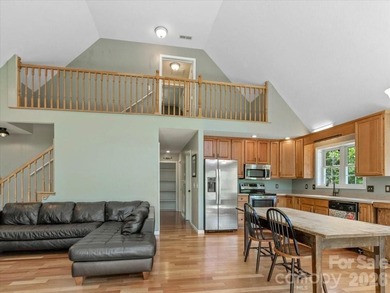 Escape to this warm and inviting 1.5-story mountain home set on - photo 7