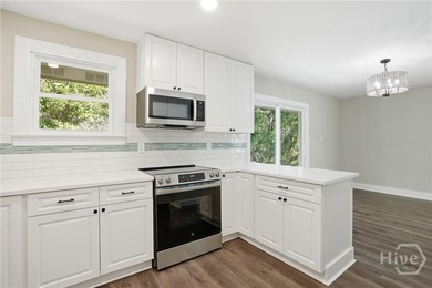 Beautifully renovated and move-in ready, this 4 bedroom, 3 - photo 11