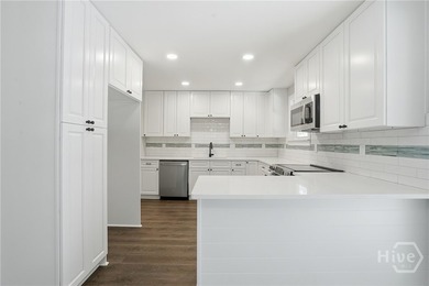 Beautifully renovated and move-in ready, this 4 bedroom, 3 - photo 12