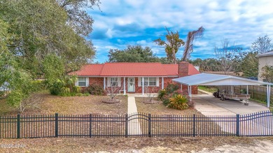 Experience waterfront living on deep-water Gulf access! Located - photo 2