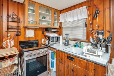 Discover 16 Nymph Rd., a delightful custom-built bungalow that - photo 9