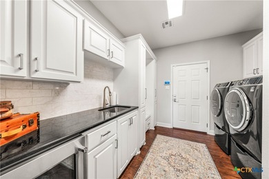 Benefitting from a distinctive, high-end remodel, this fabulous - photo 13