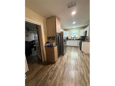 This home is in an established neighborhood, just minutes from - photo 11