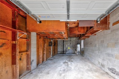 Solid and low-maintenance, this all-brick triplex sits in Garden - photo 19