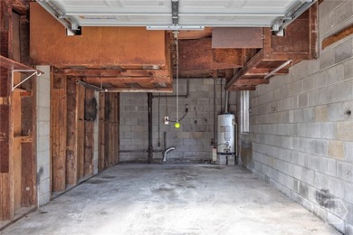 Solid and low-maintenance, this all-brick triplex sits in Garden - photo 20