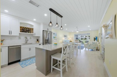MISSION LAKES - DESIRABLE FIRST-FLOOR END UNIT WITH GORGEOUS - photo 2