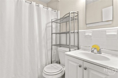 Solid and low-maintenance, this all-brick triplex sits in Garden - photo 25