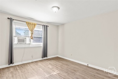 Solid and low-maintenance, this all-brick triplex sits in Garden - photo 27