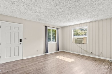 Solid and low-maintenance, this all-brick triplex sits in Garden - photo 28