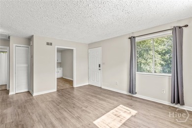 Solid and low-maintenance, this all-brick triplex sits in Garden - photo 29
