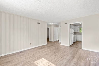 Solid and low-maintenance, this all-brick triplex sits in Garden - photo 30