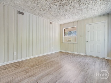 Solid and low-maintenance, this all-brick triplex sits in Garden - photo 37
