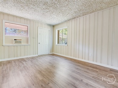 Solid and low-maintenance, this all-brick triplex sits in Garden - photo 38