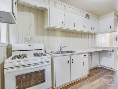 Solid and low-maintenance, this all-brick triplex sits in Garden - photo 39