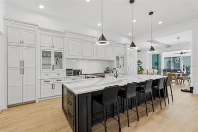 Presenting an extraordinary estate within the exclusive gated - photo 9