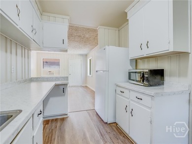 Solid and low-maintenance, this all-brick triplex sits in Garden - photo 41