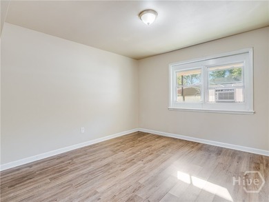 Solid and low-maintenance, this all-brick triplex sits in Garden - photo 44