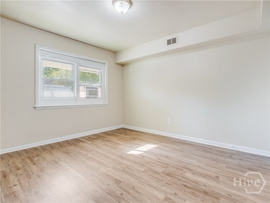 Solid and low-maintenance, this all-brick triplex sits in Garden - photo 45