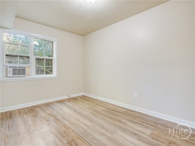 Solid and low-maintenance, this all-brick triplex sits in Garden - photo 46