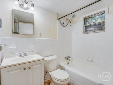 Solid and low-maintenance, this all-brick triplex sits in Garden - photo 48