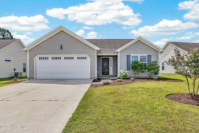 Welcome to this charming 3-bedroom, 2-bath home in the highly - photo 1