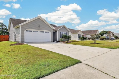 Welcome to this charming 3-bedroom, 2-bath home in the highly - photo 3