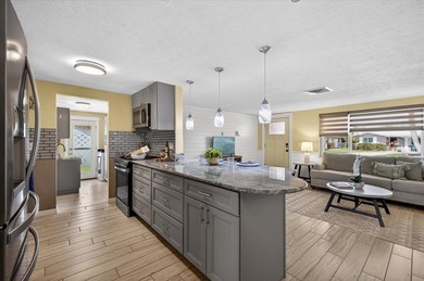 Welcome to your slice of waterfront paradise in the highly - photo 3