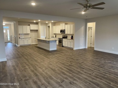 The 2906 floor plan is a spacious and well-designed single-story - photo 7