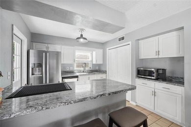 Welcome to 4712 Deerwalk Avenue, a warm and inviting - photo 17
