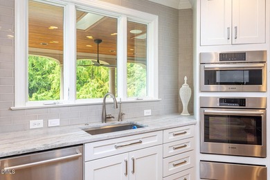 Classic elegance meets refined modern living in this exceptional - photo 22