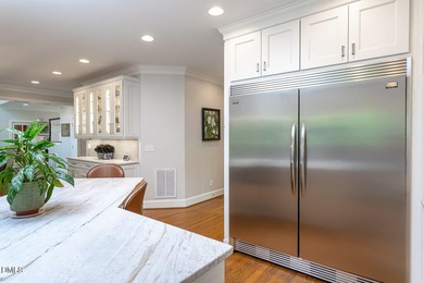 Classic elegance meets refined modern living in this exceptional - photo 24