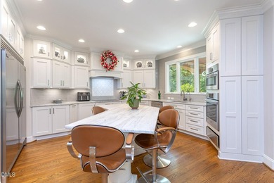 Classic elegance meets refined modern living in this exceptional - photo 25