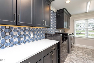 Classic elegance meets refined modern living in this exceptional - photo 46