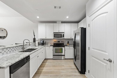 Set against the sparkling waters of Lake LBJ, this turn-key - photo 12