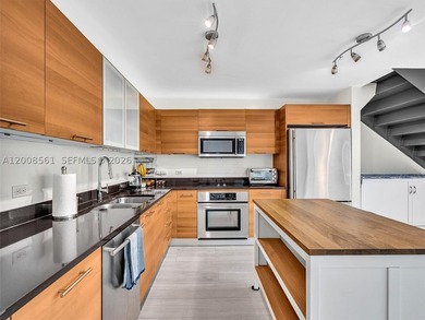 MOTIVATED SELLER | Limited Edition Duplex living in the heart of - photo 12