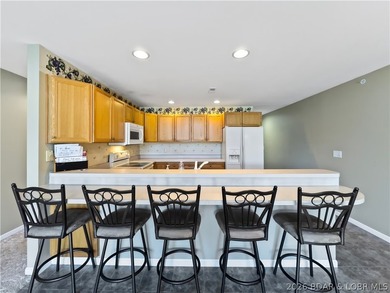 Welcome to this coveted top-level lakefront condo, offering over - photo 13