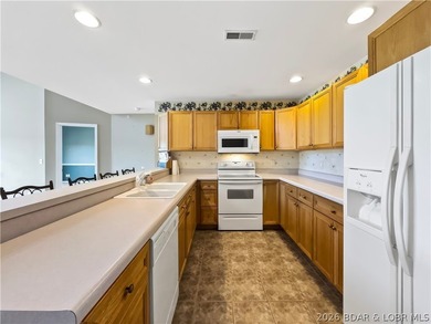 Welcome to this coveted top-level lakefront condo, offering over - photo 14