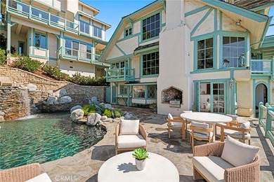 Perched above the Pacific Ocean, this rare Laguna Beach estate - photo 14
