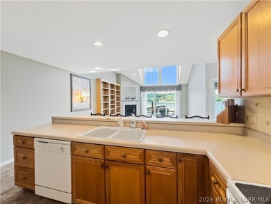 Welcome to this coveted top-level lakefront condo, offering over - photo 16