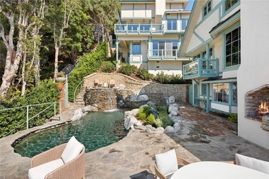 Perched above the Pacific Ocean, this rare Laguna Beach estate - photo 16