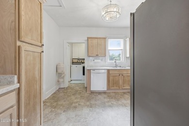 Step into timeless charm with this beautiful 5-bedroom, 2-bath - photo 8
